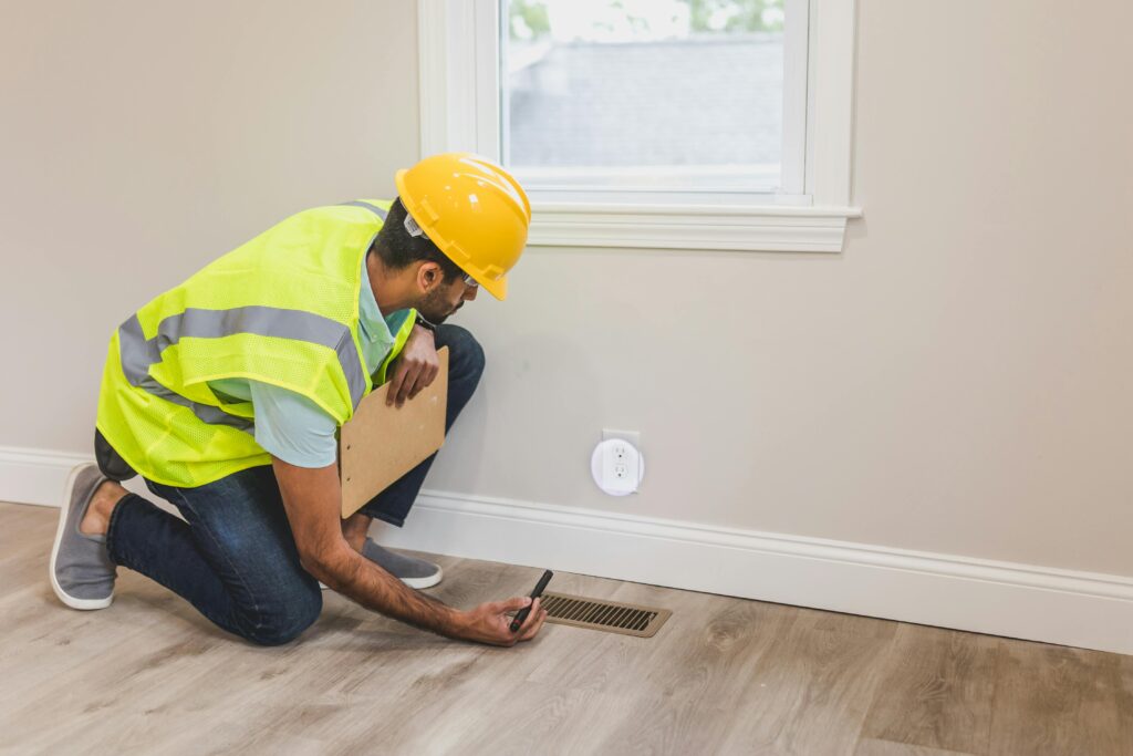 HVAC Technician Inspecting Home Furnace Issues