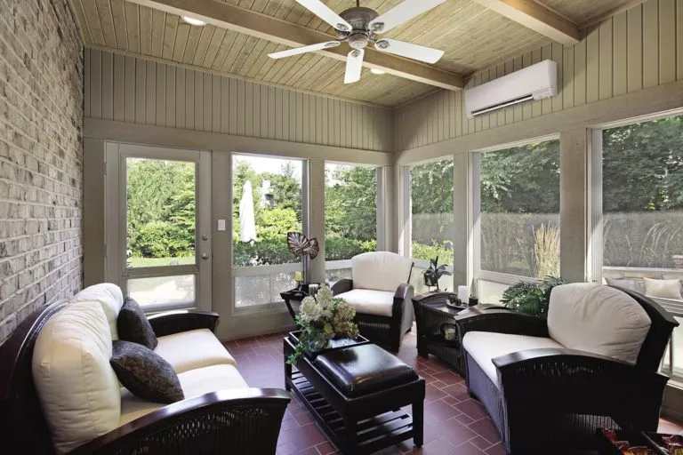 Ductless HVAC unit in a closed off outdoor porch