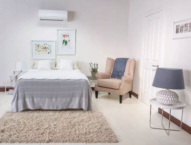 Ductless HVAC heating a residential bedroom