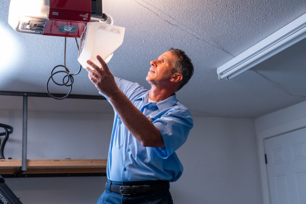 Arctic Air Tech Installing Lighting in a Garage