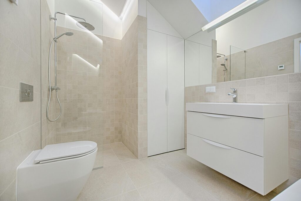 White bathroom with close-up of toilet