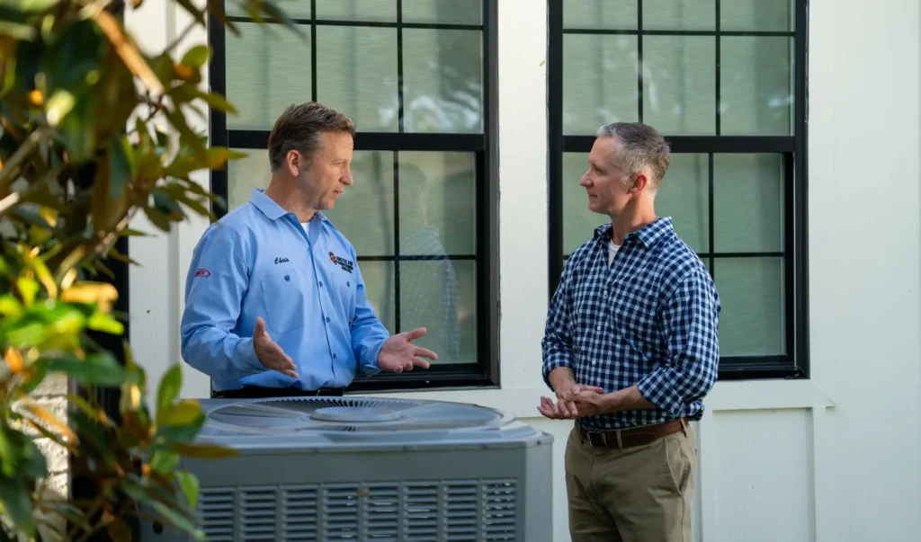 AC tech working with customer