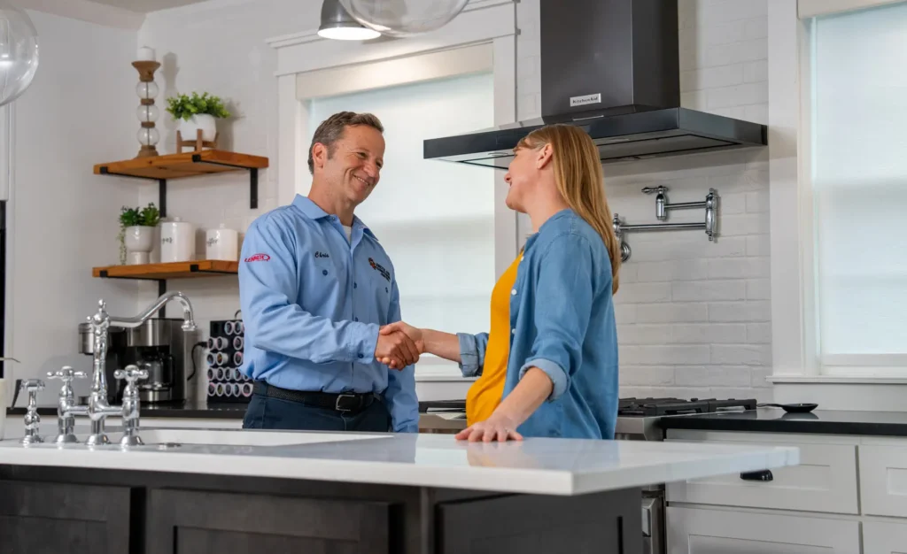 Arctic plumber greeting customer